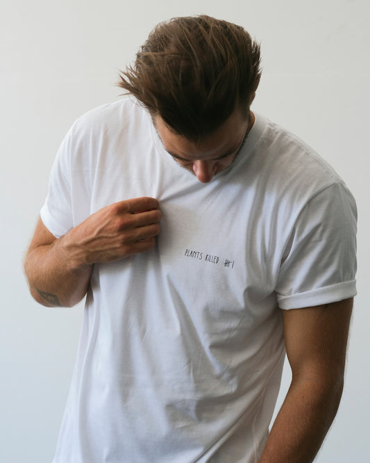 a man wearing a white shirt